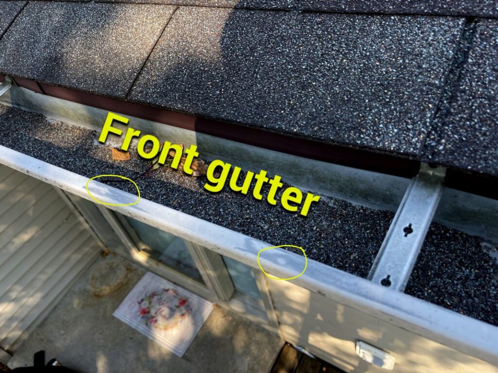 gutter-hail-damage-marked