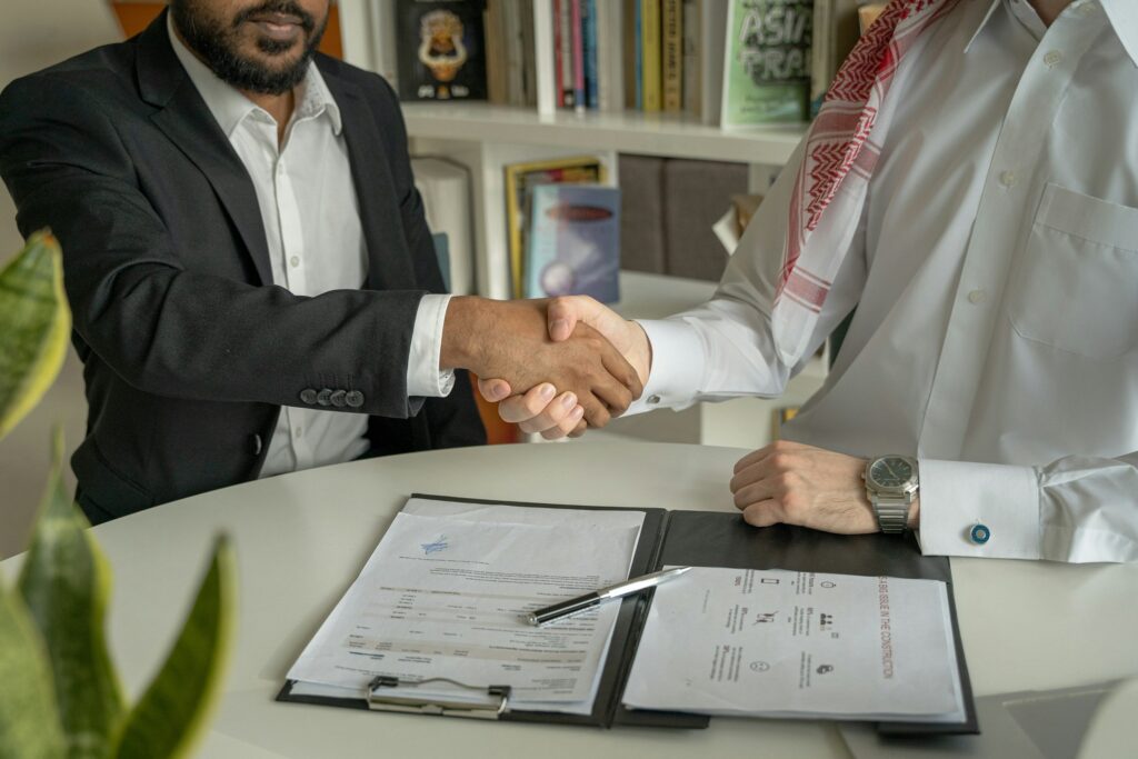 meeting deal two people handshake