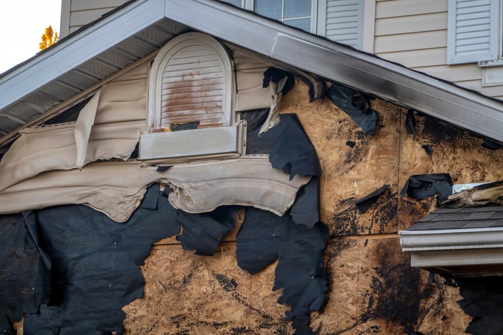 Fire damage on garage roof.
