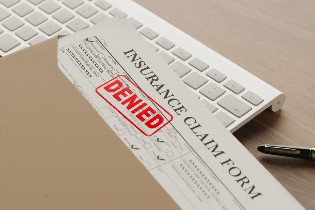 Insurance claim denied document.